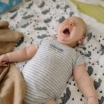 why do babies cry in their sleep